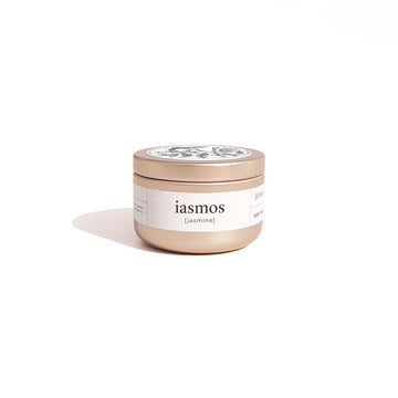 Travel size candle in brushed gold container